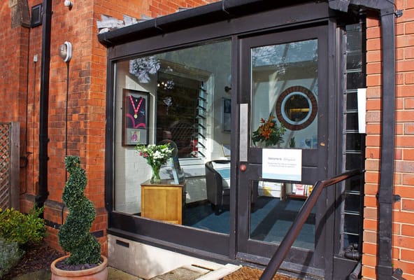 Entrance view of the facility with a welcome sign