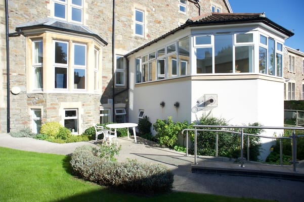Outdoor area with landscaped garden and seating