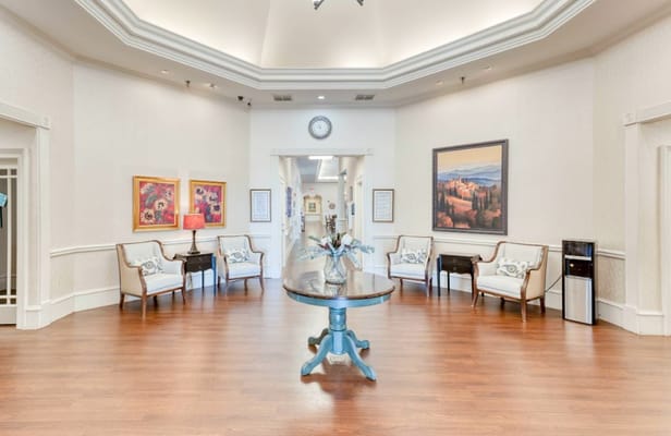 Spacious lobby with seating and artwork