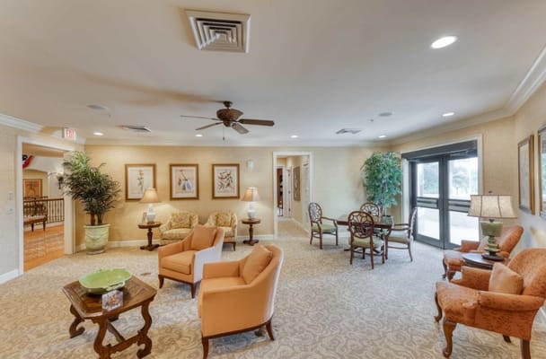 Cozy living room area with seating and decorative plants