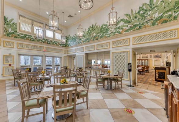 Bright and inviting dining area with murals