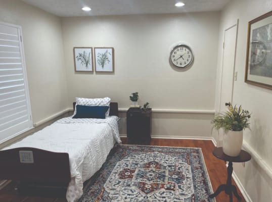 Cozy resident room with bed and decor