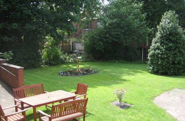 A peaceful garden area with seating