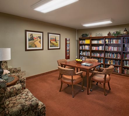 Cozy interior view of a common area with bookshelves