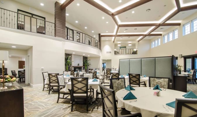 Bright dining area with elegantly set tables