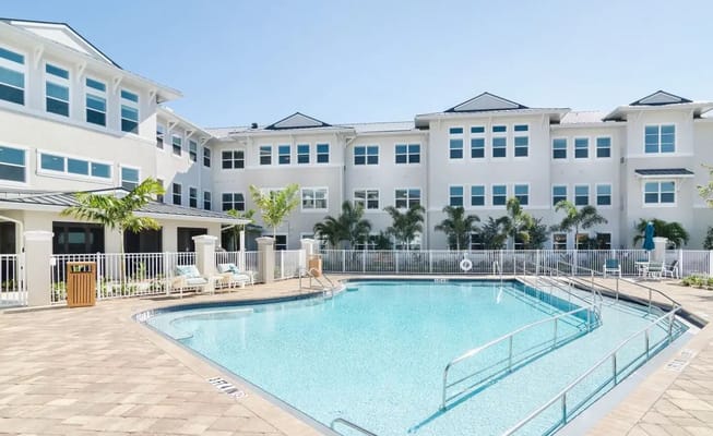Pool area with the facility building in the background