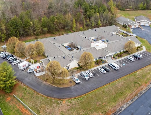 Aerial view of the American House Kingsport facility with parking lot