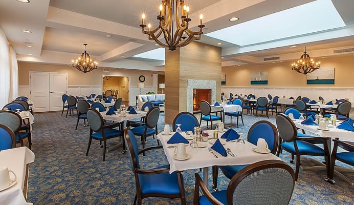 Dining room set up for a meal with elegant decor