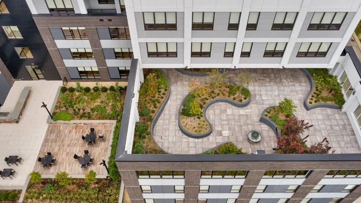 Aerial view of an outdoor garden space with seating