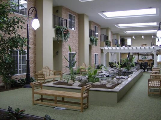 Indoor common area with seating and plants