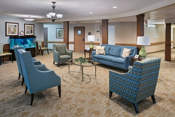 Bright common area with comfortable seating and decor