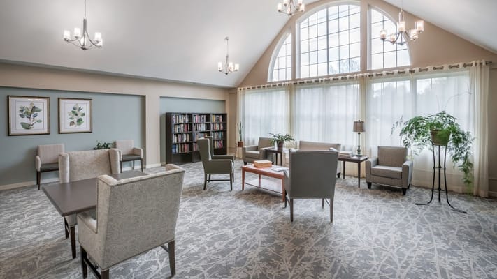 Bright and inviting common area with seating.