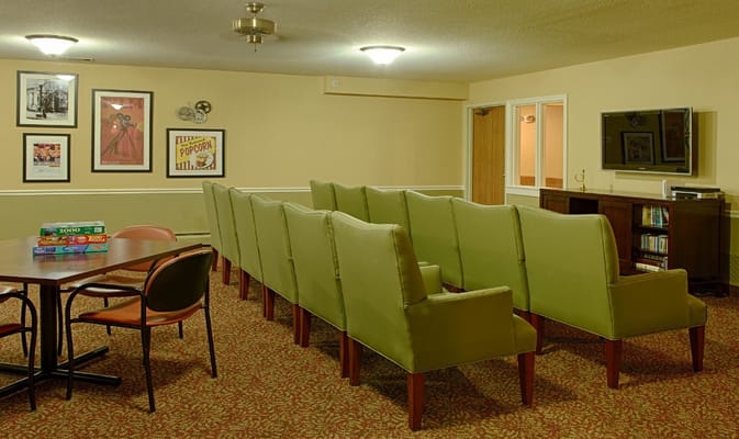 Interior view of a common area with seating and entertainment
