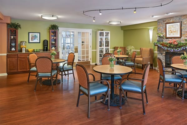 Bright common area with tables and chairs