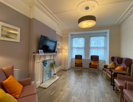 Bright common area with seating and decor