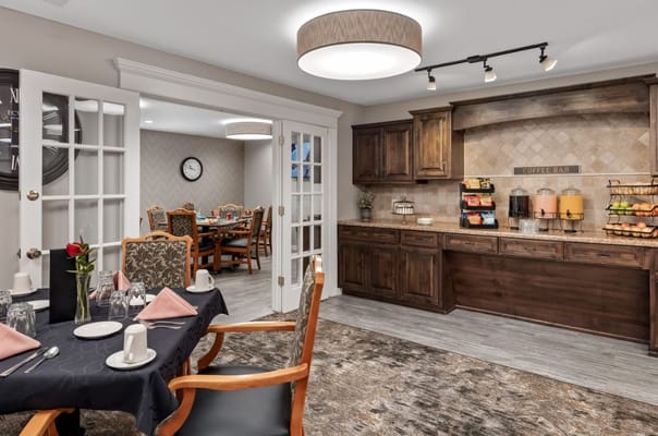 Cozy coffee bar area in Asbury Village dining room, featuring seating and refreshments.