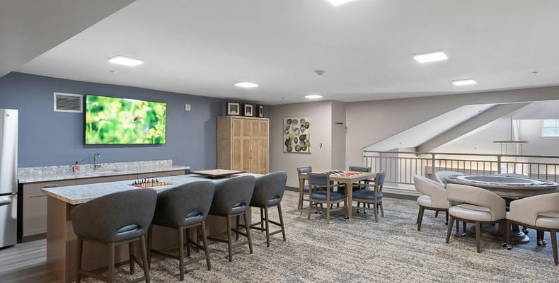 Common area with seating and a television