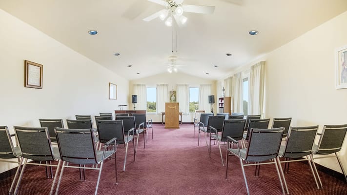 Interior view of a meeting room with chairs arranged