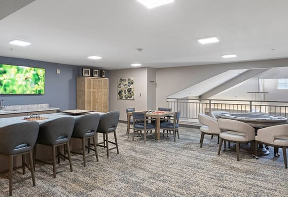 Common area with game tables and seating