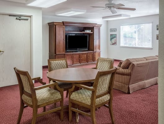 Interior common area with seating and television