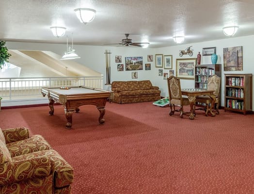 Common area with pool table and seating
