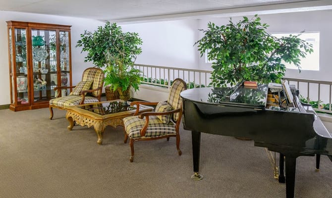 Common area with seating and a piano