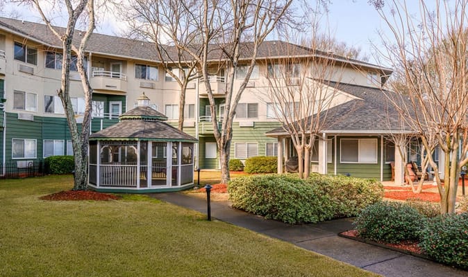 View of the outdoor space with gazebo and building