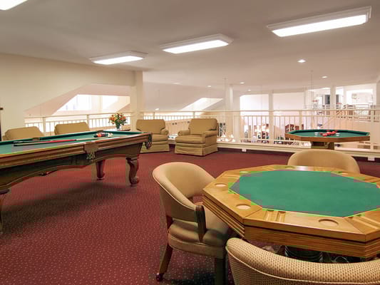 Common area with gaming tables and seating