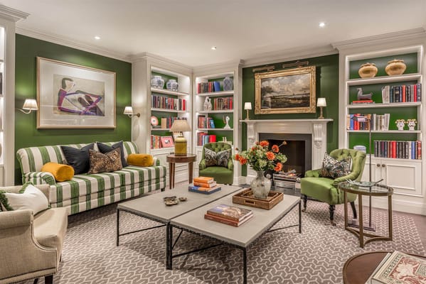 Cozy common area with comfortable seating and bookshelves