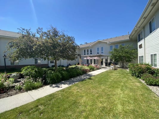 Beautiful garden area with residents enjoying the outdoor space