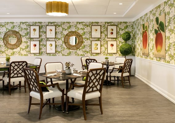 Bright dining room with decorative wall art