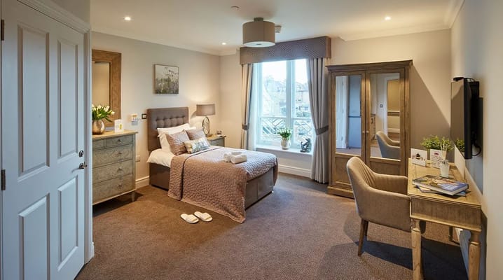 A cozy resident room with modern decor