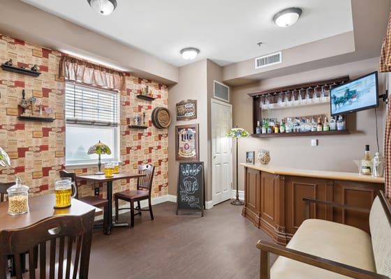 Interior lounge area with a small bar setup