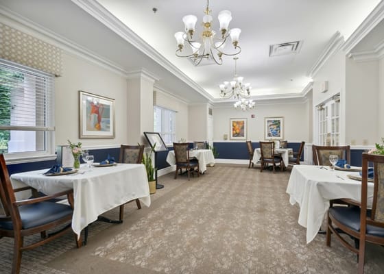 Elegant dining area with tables set for meals