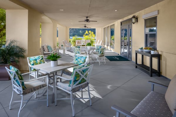 Outdoor patio area with seating and plants