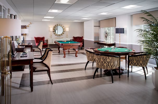 Interior common area with a pool table and seating