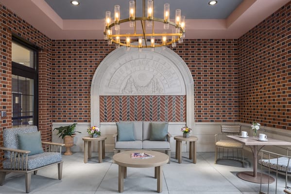 Common area with seating and decorative lighting