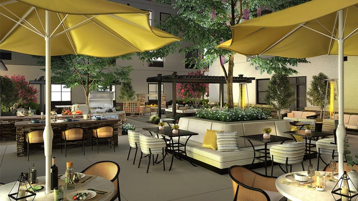 Inviting outdoor patio space with yellow umbrellas and seating