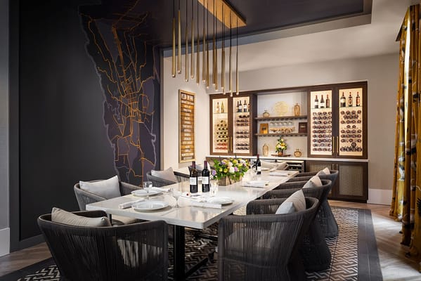 Elegant dining room with a large table set for meals