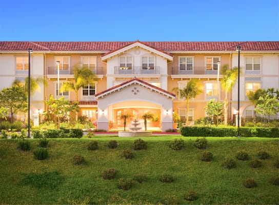 Exterior view of Belmont Village facility at dusk