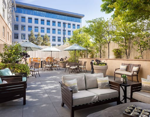 Outdoor patio area with tables and seating