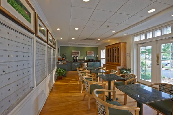 Bright communal area with tables and chairs