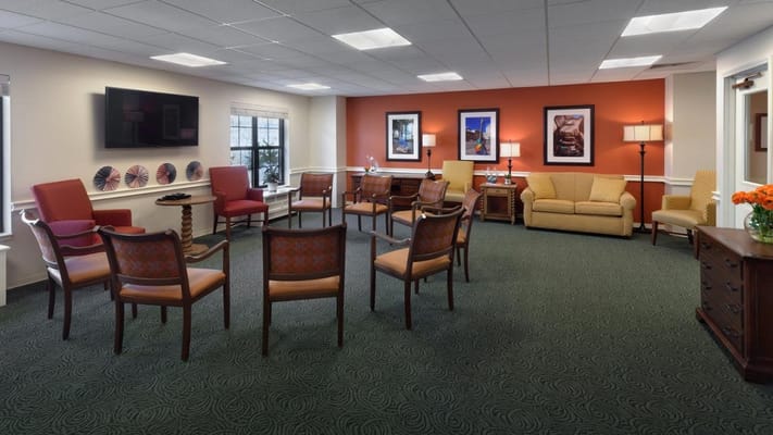 Comfortable lounge area with seating and TV