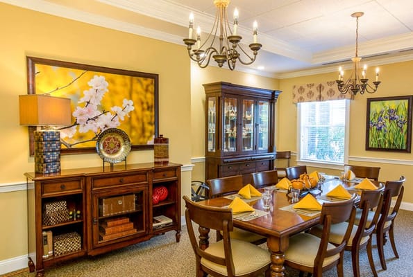 Interior dining room with a large table and decor