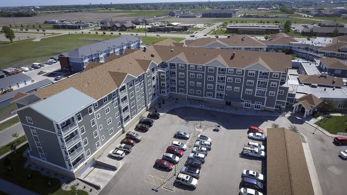 Aerial view of Bethany Retirement Living facility with parking lot