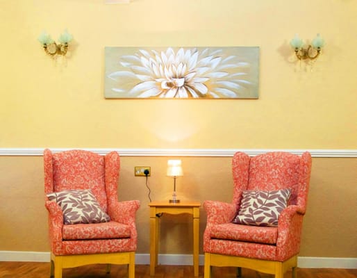Comfortable seating area in a lounge with decorative art