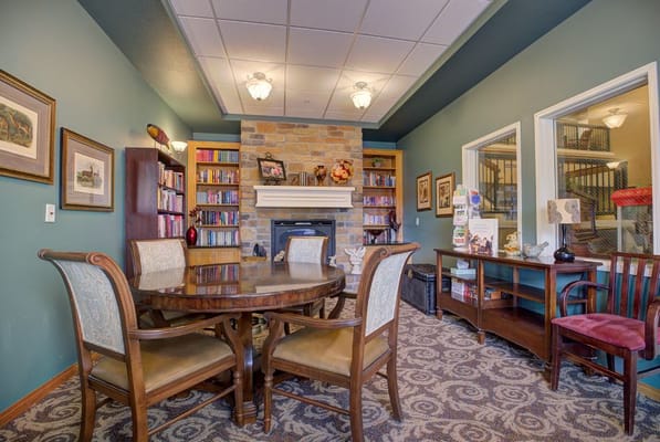 Common area with seating and bookshelves