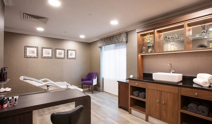 Interior view of a spa area with relaxation chairs