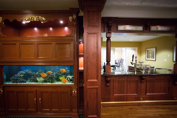 Interior common area with a fish tank and reception desk
