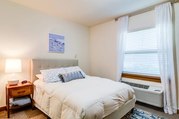 Brightly lit interior of a cozy resident room